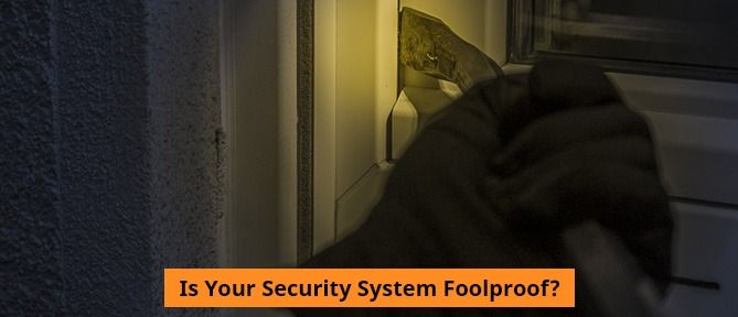 criminal breaking into house window