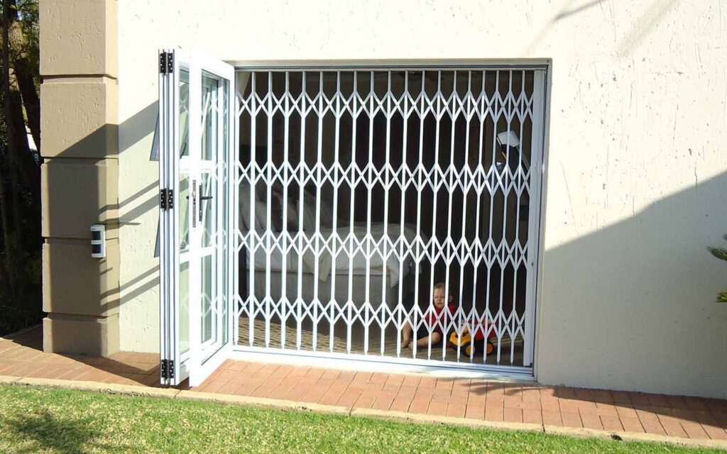 sliding glass aliminium door with security gate installation
