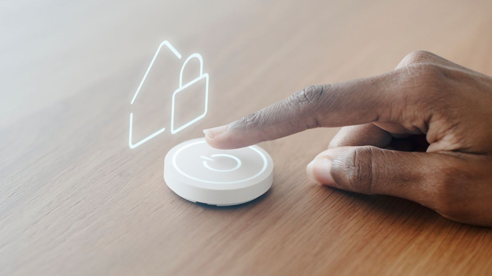 persons hand pushing an on button